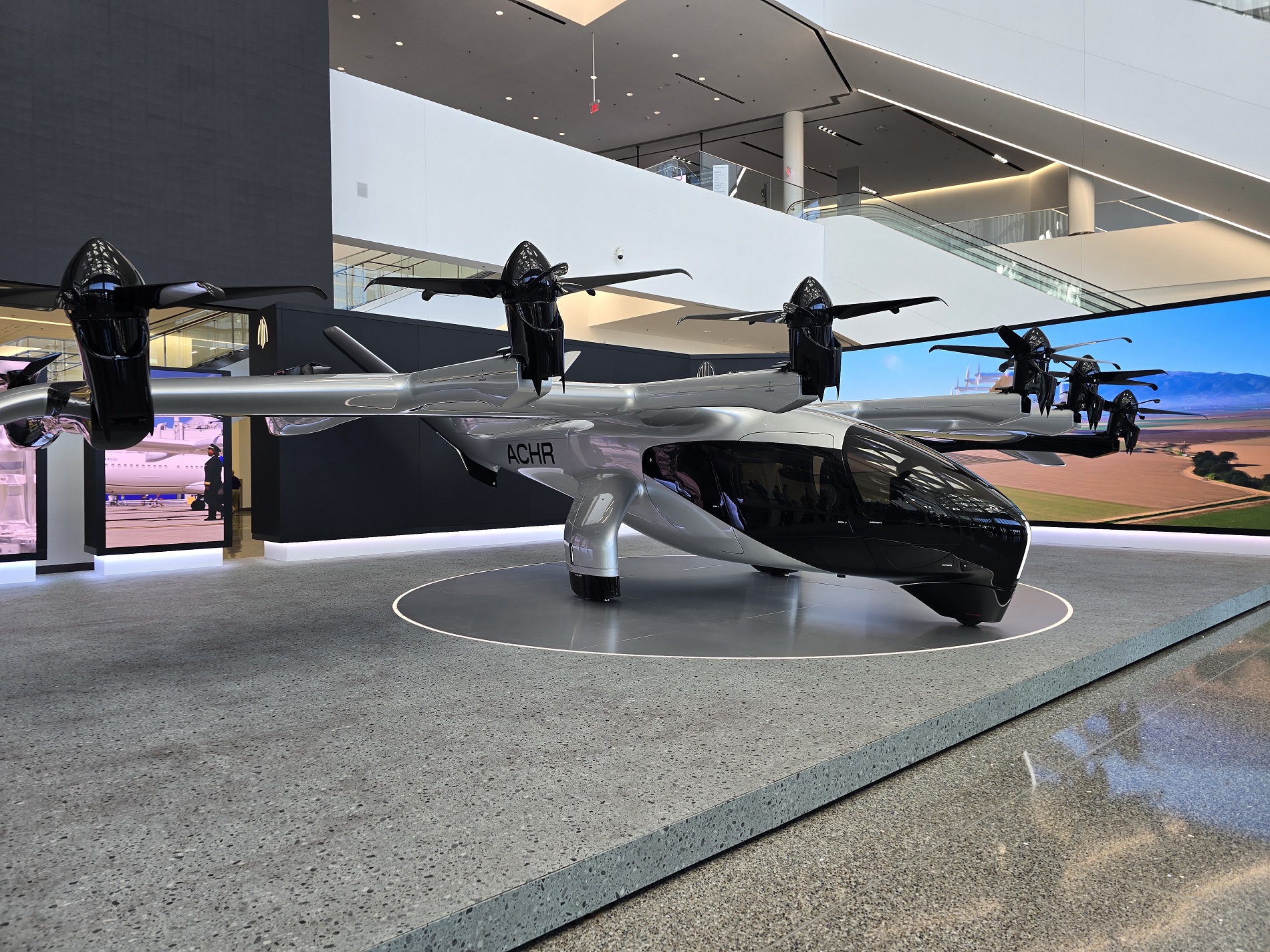 ACHR eVTOL air taxi on a vertiport pad